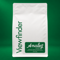 Viewfinder Analog coffee in a white bag on a green studio background