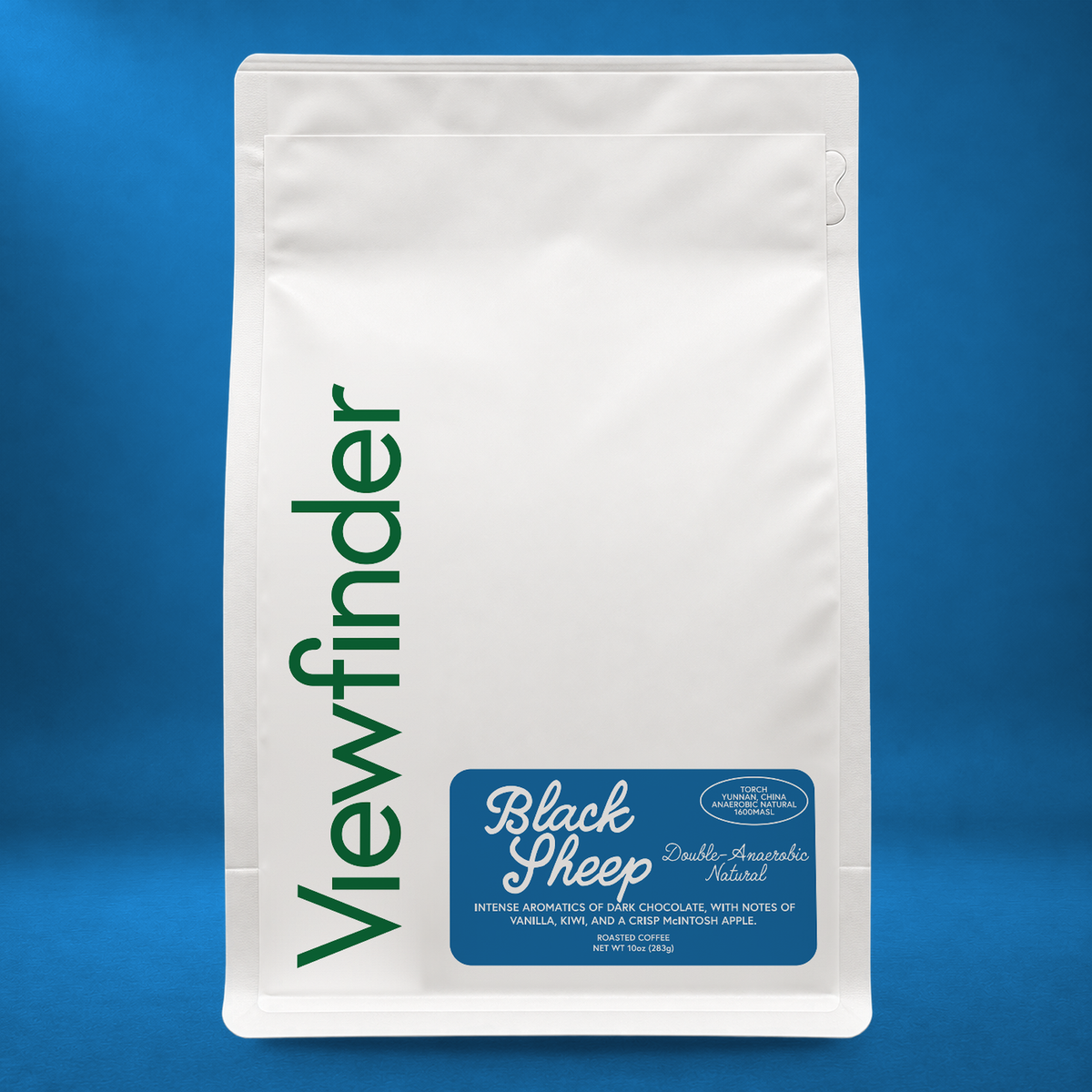 Viewfinder Black Sheep coffee in a white bag on a blue studio background