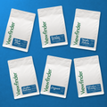 Overhead flat lay of six Viewfinder Collection coffee bags with blue labels on a blue background